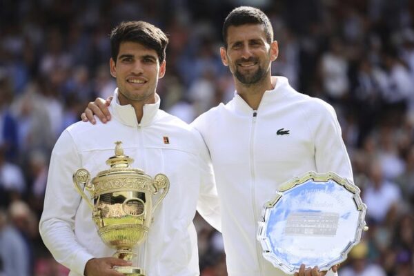 Alcaraz Sweeps Past Djokovic to Claim Second Straight Wimbledon Title 🎾🏆 Alcaraz_Sweeps_Past_Djokovic_to_Claim_Second_Straight_Wimbledon_Title___