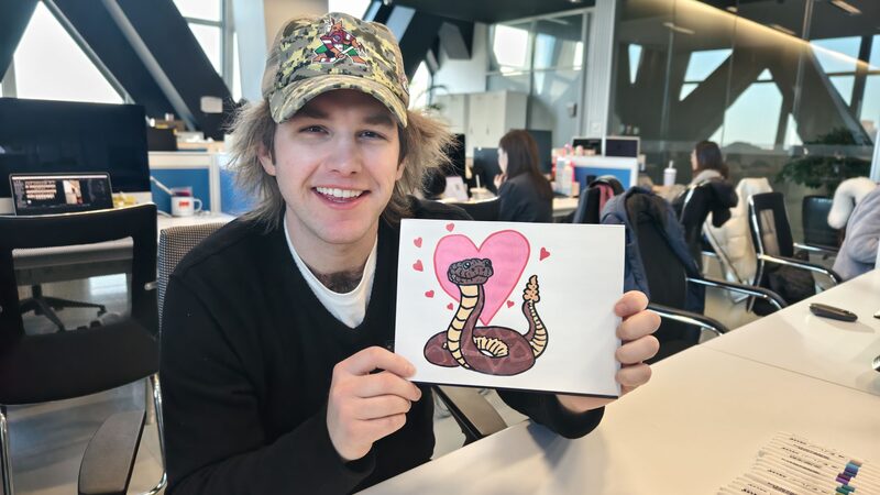 An_Artistic_Twist__Robbie_Swain_Paints_Arizona_Rattlesnake_for_Chinese_New_Year___ video poster