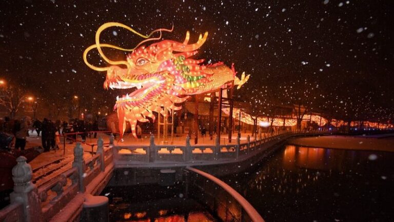Beijing_s_200_Meter_Dragon_Lantern_Shines_Amid_First_Snowfall____