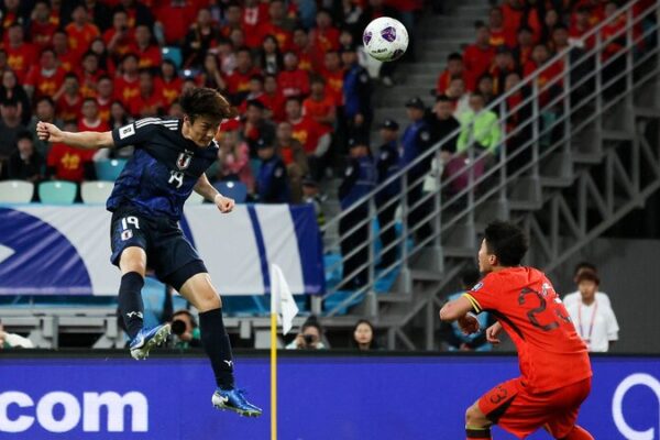China Battles Hard in 3-1 World Cup Qualifier Against Japan in Xiamen China_Battles_Hard_in_3_1_World_Cup_Qualifier_Against_Japan_in_Xiamen