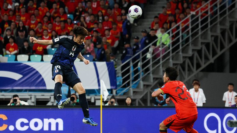 China_Battles_Hard_in_3_1_World_Cup_Qualifier_Against_Japan_in_Xiamen - News for amigos, by amigos China_Battles_Hard_in_3_1_World_Cup_Qualifier_Against_Japan_in_Xiamen