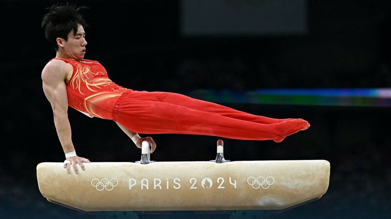 China_Takes_Silver_in_Thrilling_Men_s_Gymnastics_at_Paris_Olympics - News for amigos, by amigos China_Takes_Silver_in_Thrilling_Men_s_Gymnastics_at_Paris_Olympics