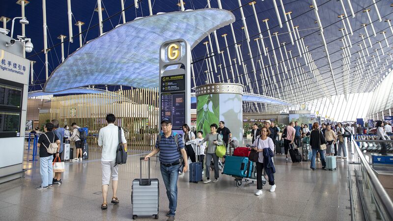 China_s_Skies_Reach_New_Heights__Record_Air_Traffic_in_Q3_ - News for amigos, by amigos China_s_Skies_Reach_New_Heights__Record_Air_Traffic_in_Q3_