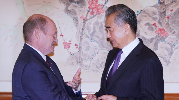 Chinese Foreign Minister Wang Yi meets U.S. Senator Chris Coons at UN 🌐 Chinese_Foreign_Minister_Wang_Yi_meets_U_S__Senator_Chris_Coons_at_UN__