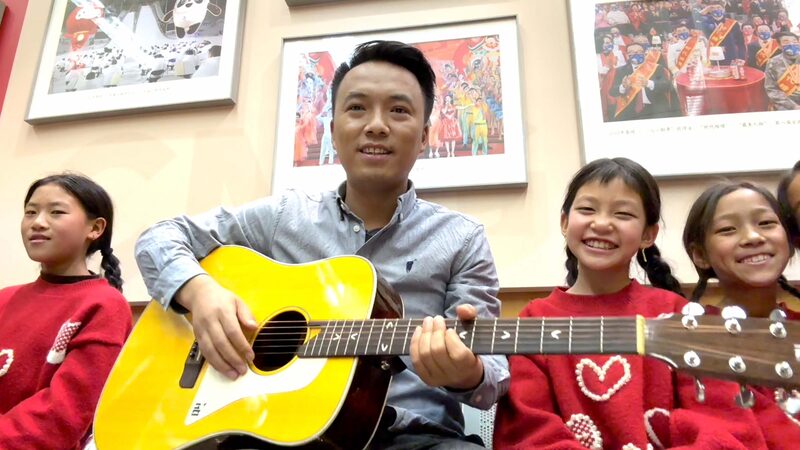 Daliang_Mountain_s_Niuniu_Choir_Tunes_Up_for_Spring_Festival_Gala_Debut___poster - News for amigos, by amigos Daliang_Mountain_s_Niuniu_Choir_Tunes_Up_for_Spring_Festival_Gala_Debut__ video poster