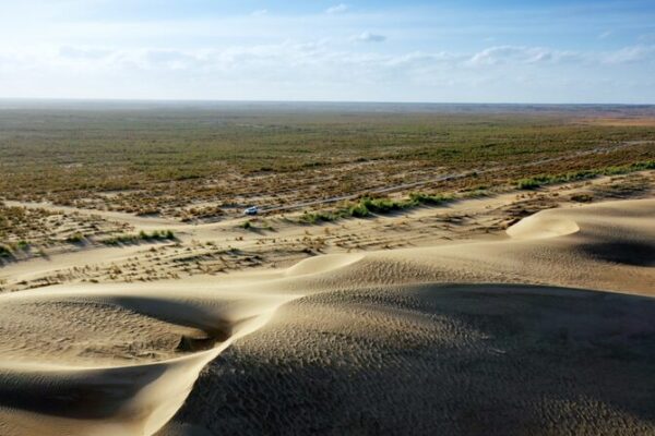Defying Deserts: Three Generations Create Green Barrier in Xinjiang Defying_Deserts__Three_Generations_Create_Green_Barrier_in_Xinjiang