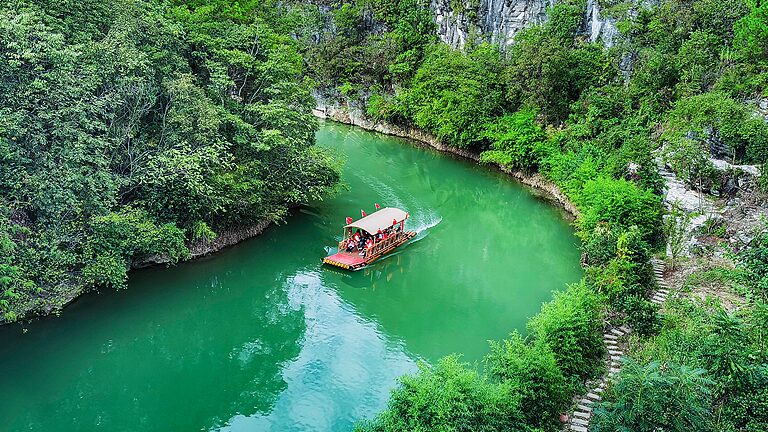Discover_the_Hidden_Gem_of_Guizhou__Jiudaowan_s_Enchanting_River_Cruise - News for amigos, by amigos Discover_the_Hidden_Gem_of_Guizhou__Jiudaowan_s_Enchanting_River_Cruise