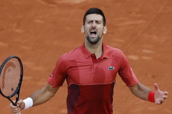 Djokovic Battles Past Cerundolo in Epic French Open Thriller 🎾 Djokovic_Battles_Past_Cerundolo_in_Epic_French_Open_Thriller__