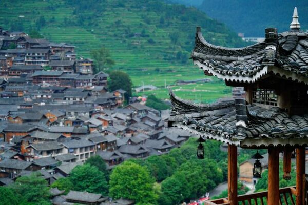 Experience the Vibrant Culture of Xijiang Qianhu Miao Village 🌄 Experience_the_Vibrant_Culture_of_Xijiang_Qianhu_Miao_Village__