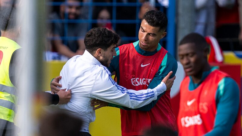 Fan_Sneaks_Onto_Pitch_for_Selfie_with_Cristiano_Ronaldo_During_Portugal_Training____ - News for amigos, by amigos Fan_Sneaks_Onto_Pitch_for_Selfie_with_Cristiano_Ronaldo_During_Portugal_Training____