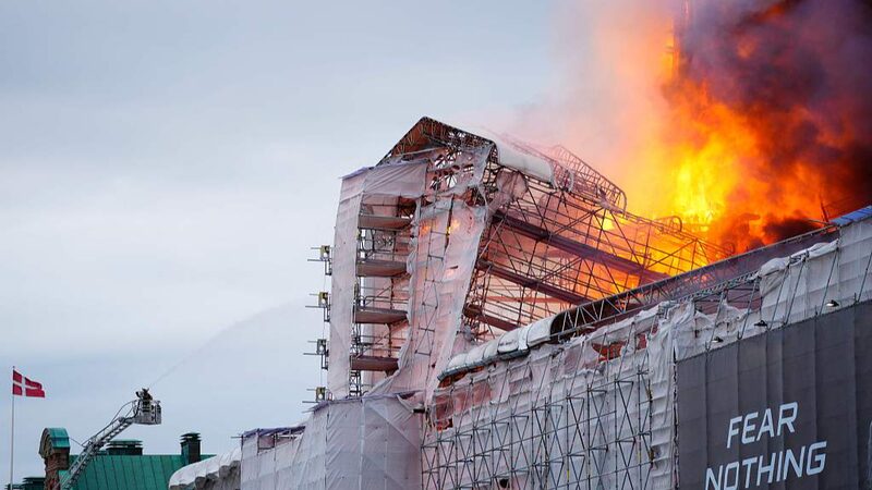 Fire_Engulfs_Copenhagen_s_Old_Stock_Exchange__Iconic_Spire_Collapses_poster - News for amigos, by amigos _Fire_Engulfs_Copenhagen_s_Old_Stock_Exchange__Iconic_Spire_Collapses video poster