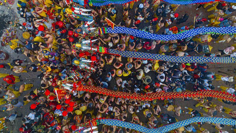 Firecracker_Dragon_Festival_Ignites_Joy_in_Guangxi___ - News for amigos, by amigos Firecracker_Dragon_Festival_Ignites_Joy_in_Guangxi___