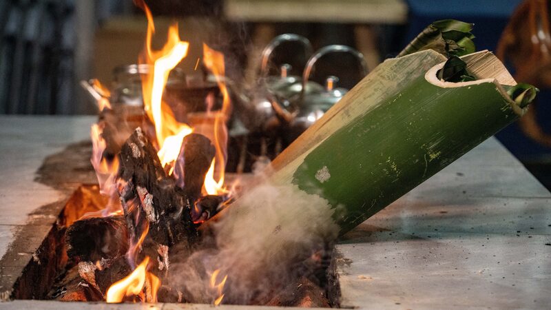 Flaming_Bamboo_Tube_Chicken_Rice__Yunnan_s_Ancient_Culinary_Marvel - News for amigos, by amigos Flaming_Bamboo_Tube_Chicken_Rice__Yunnan_s_Ancient_Culinary_Marvel