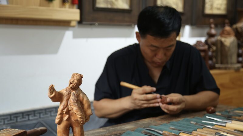 From_Trees_to_Treasures__Yang_s_Jujube_Wood_Carvings_Bring_Shaanxi_s_Traditions_to_Life___ - News for amigos, by amigos From_Trees_to_Treasures__Yang_s_Jujube_Wood_Carvings_Bring_Shaanxi_s_Traditions_to_Life___