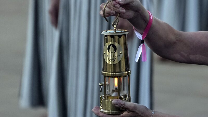 Greece_Passes_the_Torch__Paris_2024_Olympics_Flame_Begins_Its_Journey_ - News for amigos, by amigos __Greece_Passes_the_Torch__Paris_2024_Olympics_Flame_Begins_Its_Journey_