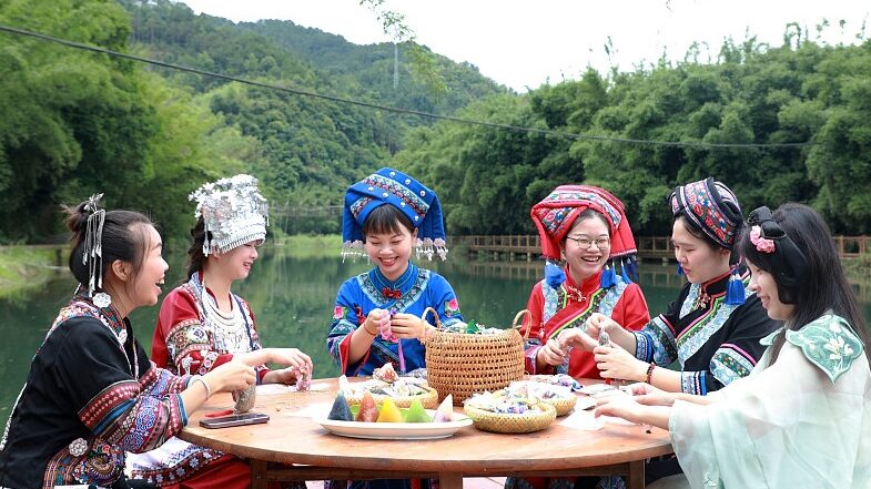 Guangxi_s_Colorful_Zongzi__A_Vibrant_Taste_of_the_Dragon_Boat_Festival - News for amigos, by amigos Guangxi_s_Colorful_Zongzi__A_Vibrant_Taste_of_the_Dragon_Boat_Festival