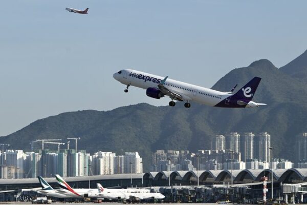 Hong Kong Soars Higher with New Three-Runway System 🌐✈️ Hong_Kong_Soars_Higher_with_New_Three_Runway_System____