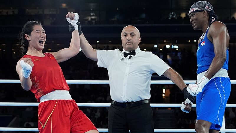 Li_Qian_Makes_Olympic_History_with_Gold_Win_in_Paris___ - News for amigos, by amigos Li_Qian_Makes_Olympic_History_with_Gold_Win_in_Paris___