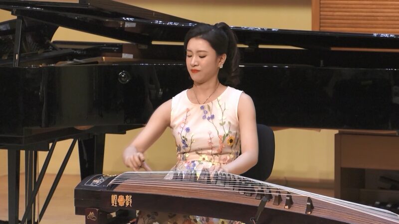Macao_s_Guzheng_Genius__Bridging_Cultures_Through_Music - News for amigos, by amigos Macao_s_Guzheng_Genius__Bridging_Cultures_Through_Music