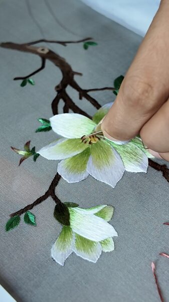 Magnolia_Magic__Wuxi_s_Ancient_Embroidery_Brings_Blossoms_to_Life__ video poster