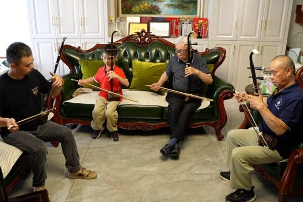 Melodies Across Generations: Wuxi’s Qian Family Unites Through Erhu 🎻 Melodies_Across_Generations__Wuxi_s_Qian_Family_Unites_Through_Erhu__