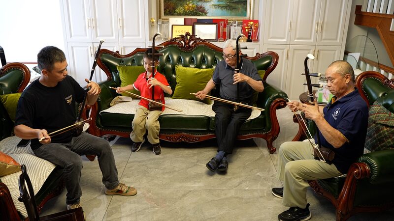 Melodies_Across_Generations__Wuxi_s_Qian_Family_Unites_Through_Erhu__ - News for amigos, by amigos Melodies_Across_Generations__Wuxi_s_Qian_Family_Unites_Through_Erhu__
