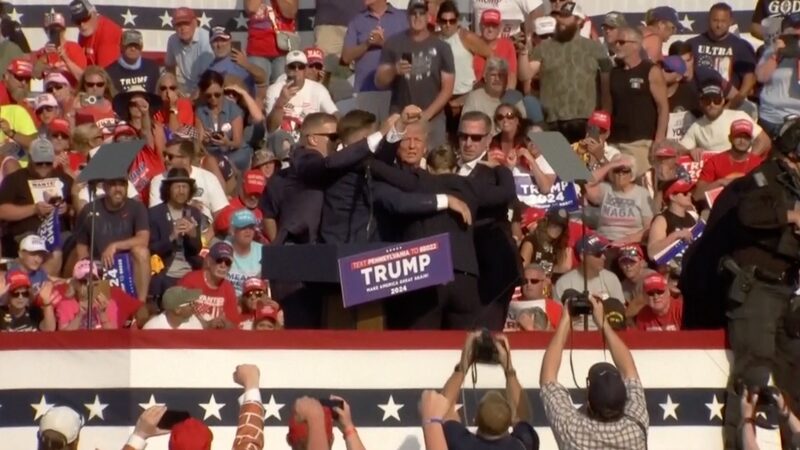 Shots_Fired_at_Trump_Rally__Former_President_Safe_After_Bloody_Scare_poster - News for amigos, by amigos Shots_Fired_at_Trump_Rally__Former_President_Safe_After_Bloody_Scare video poster