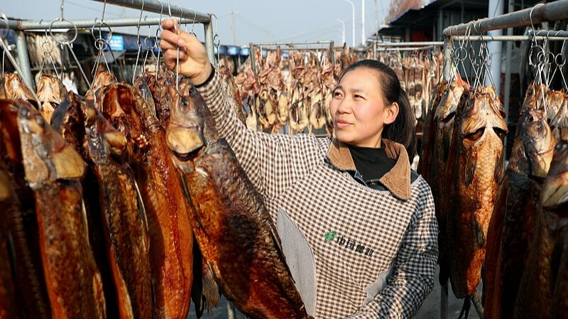 Sizzling_Sun_and_Salty_Fish__Suqian_s_Festive_Prep___ - News for amigos, by amigos Sizzling_Sun_and_Salty_Fish__Suqian_s_Festive_Prep___