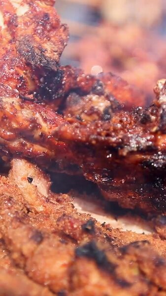 Sizzling_Suya__Nigeria_s_Street_BBQ_Delight video poster