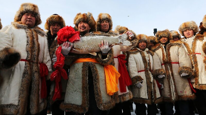 Snow_Capped_Ulungur_Lake_Hosts_Spectacular_Winter_Fishing_Festival_in_Xinjiang_poster - News for amigos, by amigos Snow_Capped_Ulungur_Lake_Hosts_Spectacular_Winter_Fishing_Festival_in_Xinjiang video poster