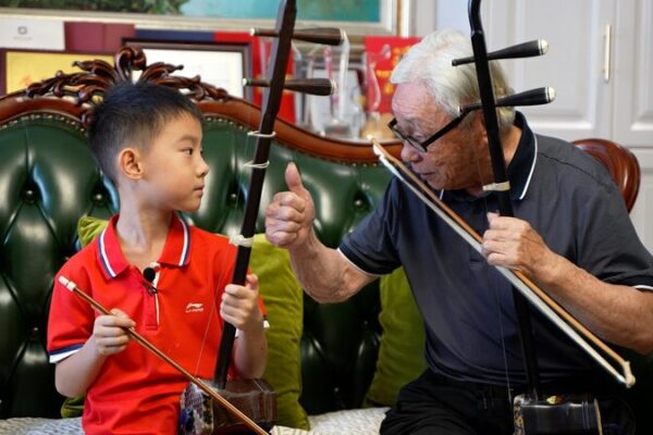 Strings Across Generations: The Qian Family’s Melodic Bond Over the Erhu Strings_Across_Generations__The_Qian_Family_s_Melodic_Bond_Over_the_Erhu video poster