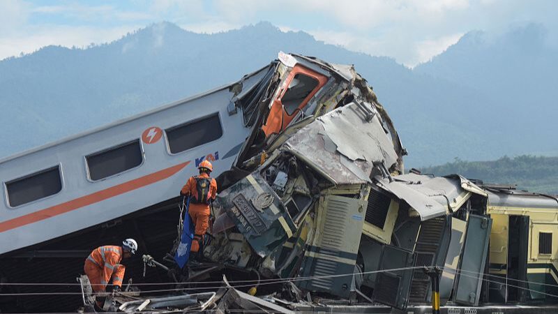 Two_Trains_Collide_in_Indonesia_s_Java_Island__Rescue_Underway_poster - News for amigos, by amigos __Two_Trains_Collide_in_Indonesia_s_Java_Island__Rescue_Underway video poster