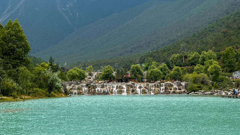Unveiling_Yunnan_s_Blue_Moon_Valley__A_Must_Visit_Hidden_Gem___poster - News for amigos, by amigos Unveiling_Yunnan_s_Blue_Moon_Valley__A_Must_Visit_Hidden_Gem__ video poster