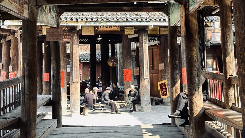 Unwinding_in_Zhaoxing_Dong_Village__Chess__Tea__and_Timeless_Traditions - News for amigos, by amigos Unwinding_in_Zhaoxing_Dong_Village__Chess__Tea__and_Timeless_Traditions