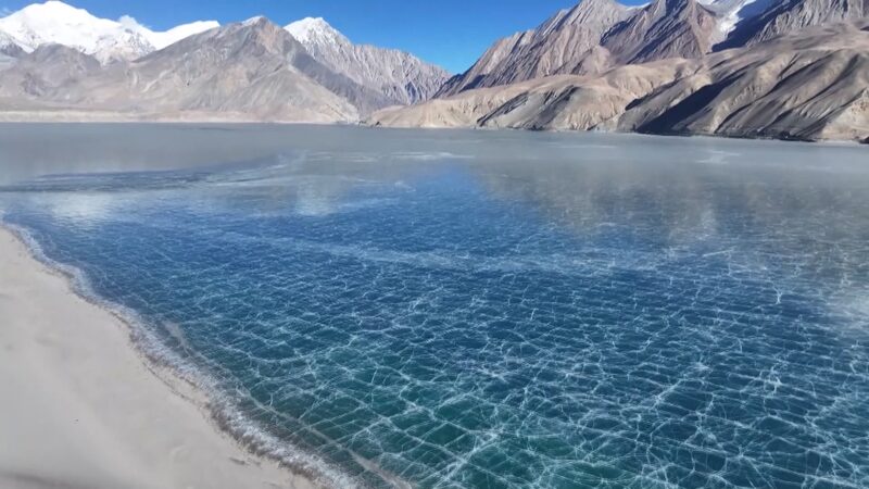 Where_Ice_Meets_Sand__Xinjiang_s_Baisha_Lake_Dazzles_with_Frozen_Beauty______poster - News for amigos, by amigos Where_Ice_Meets_Sand__Xinjiang_s_Baisha_Lake_Dazzles_with_Frozen_Beauty_____ video poster