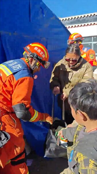 Xigaze_Residents_Share_Warm_Meals_with_Firefighters_After_Earthquake_poster - News for amigos, by amigos Xigaze_Residents_Share_Warm_Meals_with_Firefighters_After_Earthquake video poster