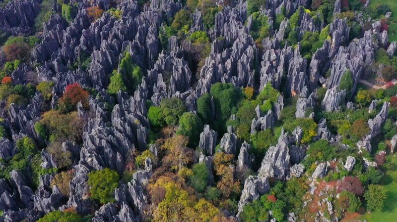 Yunnan_s_Stone_Forest__China_s_Enchanting_Karst_Wonderland___poster - News for amigos, by amigos Yunnan_s_Stone_Forest__China_s_Enchanting_Karst_Wonderland__ video poster