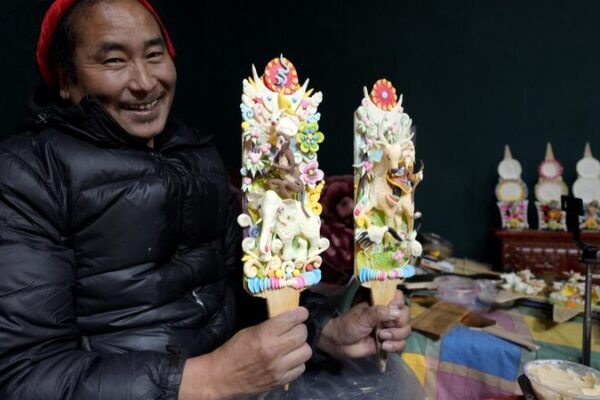Vibrant Yak Butter Sculptures Illuminate Tibetan New Year Celebrations 🎨✨ Vibrant_Yak_Butter_Sculptures_Illuminate_Tibetan_New_Year_Celebrations___