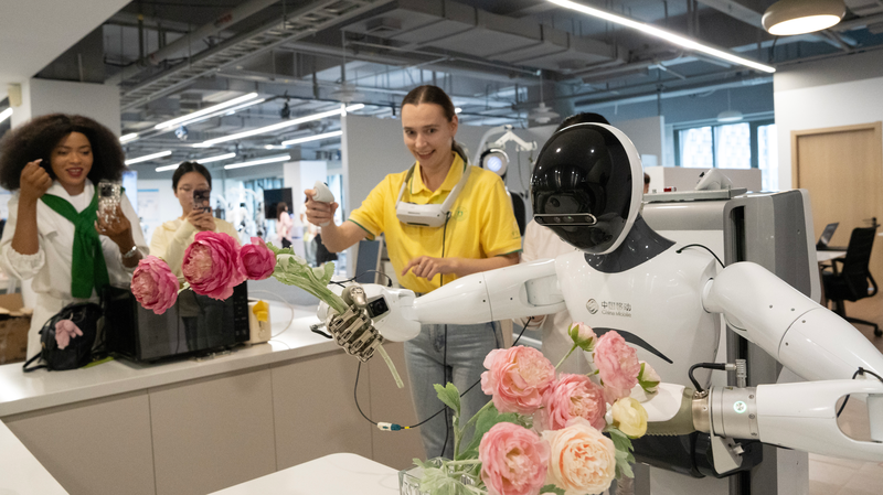 International_Youths_Embrace_AI___Robotics_in_Hangzhou - News for amigos, by amigos International_Youths_Embrace_AI___Robotics_in_Hangzhou