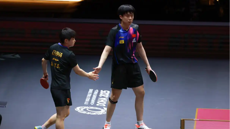 No Racket Drama: Wang & Sun Charge Ahead at ITTF Finals No_Racket_Drama__Wang___Sun_Charge_Ahead_at_ITTF_Finals
