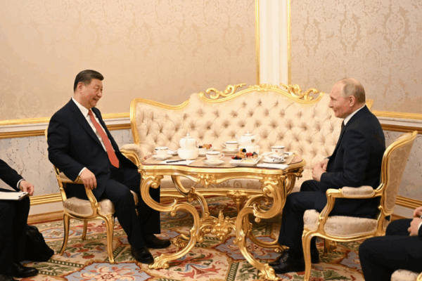 Tea Time Talks: Xi & Putin Chart a Path for Global Governance Tea_Time_Talks__Xi___Putin_Chart_a_Path_for_Global_Governance