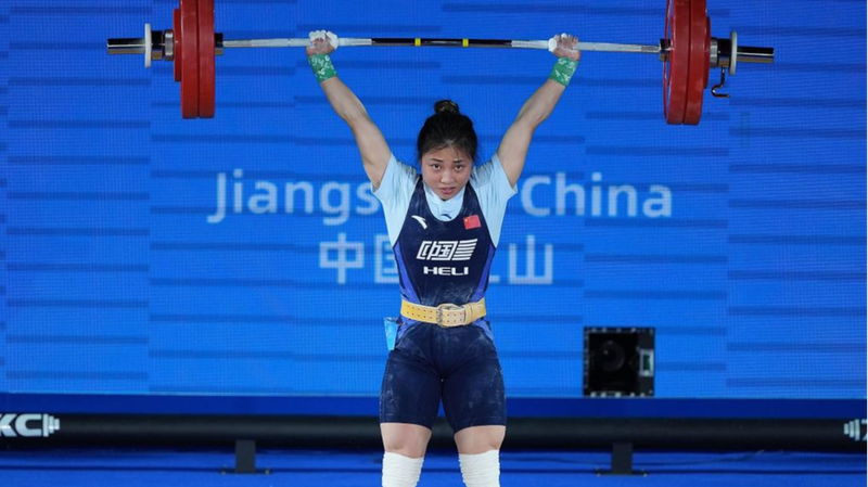 Zhang_Haiqin_Shines__Record_Breaking_Performance_at_Asian_Weightlifting_Champs - News for amigos, by amigos Zhang_Haiqin_Shines__Record_Breaking_Performance_at_Asian_Weightlifting_Champs