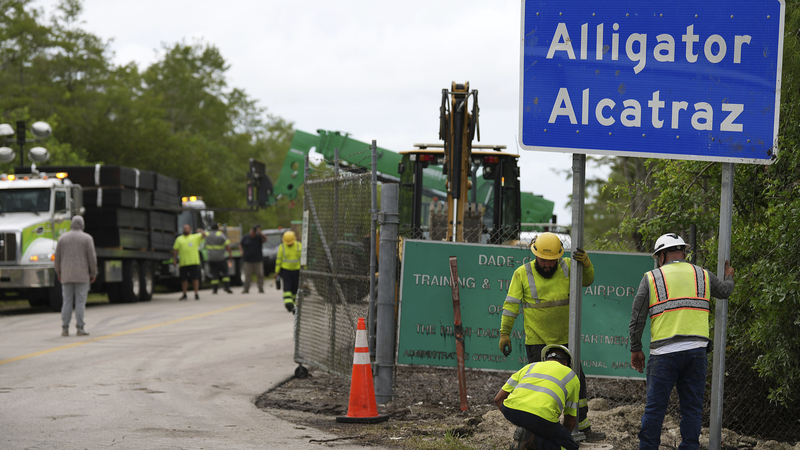 Detainees Arrive at Florida’s ‘Alligator Alcatraz’ Amid Deportation Drive Detainees_Arrive_at_Florida_s__Alligator_Alcatraz__Amid_Deportation_Drive