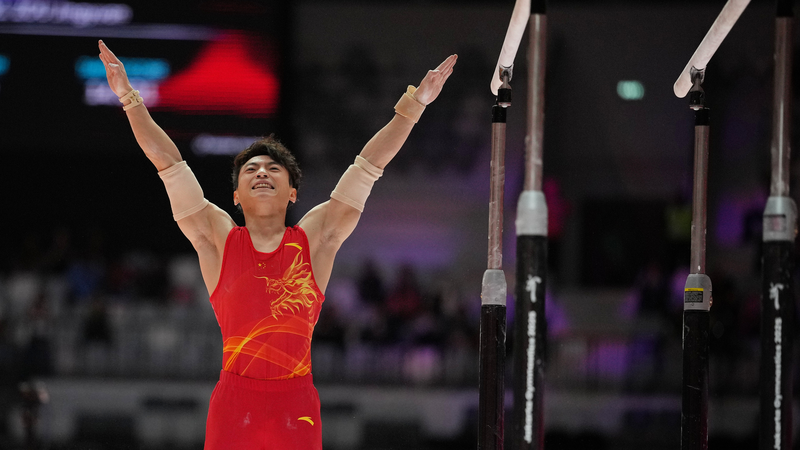 Zou_and_Zhang_Shine_as_China_Dominates_Artistic_Gymnastics_Worlds - News for amigos, by amigos Zou_and_Zhang_Shine_as_China_Dominates_Artistic_Gymnastics_Worlds