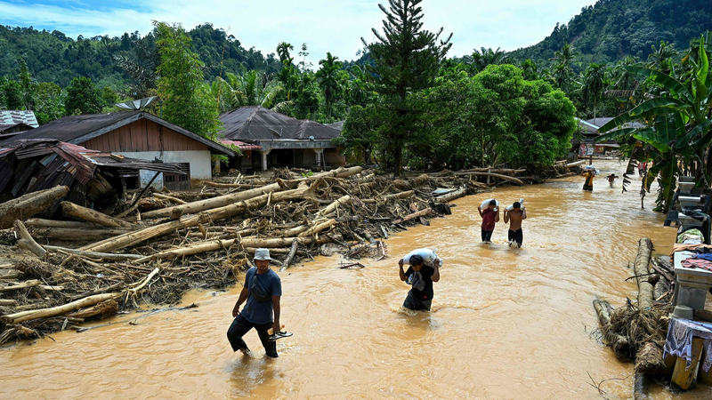 Indonesia_Floods___Landslides_Toll_Rises_to_712_Amid_Rescue_Efforts - News for amigos, by amigos Indonesia_Floods___Landslides_Toll_Rises_to_712_Amid_Rescue_Efforts