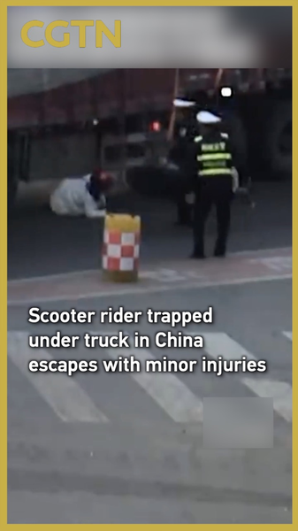 Scooter_Rider_Miraculously_Escapes_After_Truck_Crash_in_Anhui_poster - News for amigos, by amigos Scooter_Rider_Miraculously_Escapes_After_Truck_Crash_in_Anhui video poster