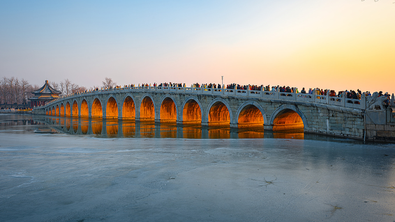 Sunset_Magic__Seventeen_Arch_Bridge_Glows_at_Summer_Palace_poster - News for amigos, by amigos Sunset_Magic__Seventeen_Arch_Bridge_Glows_at_Summer_Palace video poster